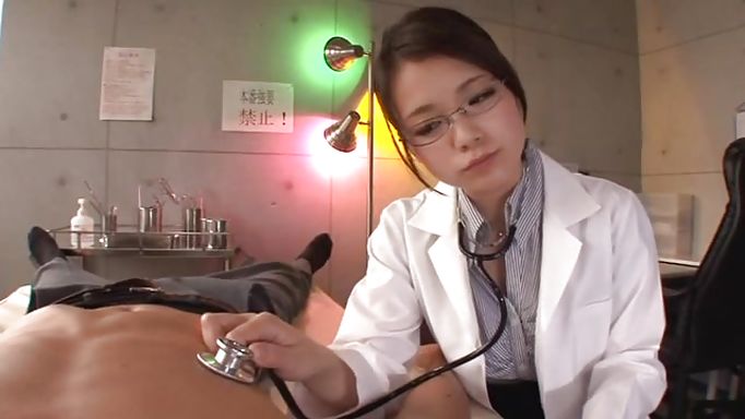Spectacled Asian Babe Gives Handjob To Her Patient