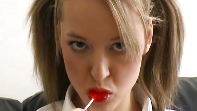 Hot Young Teen Sucks On A Candy While Rubbing Pussy
