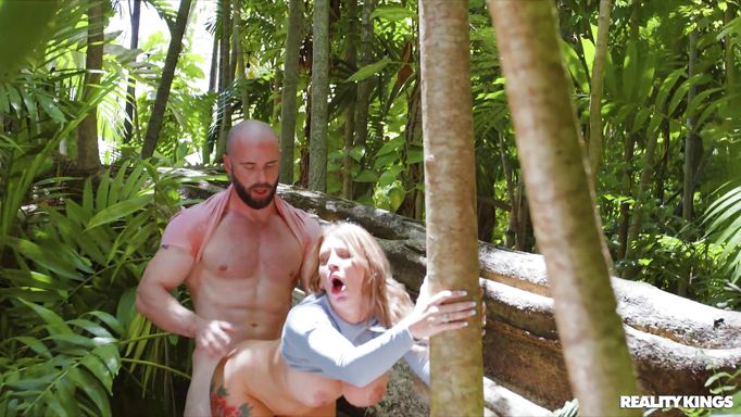 Busty Babe Fucks A Muscular Stud In The Jungle