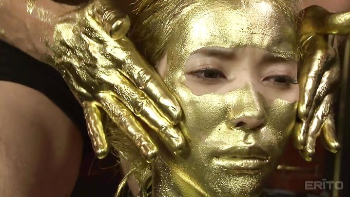 Japanese Submissive In Gold Body Paint Fingers Her Pussy