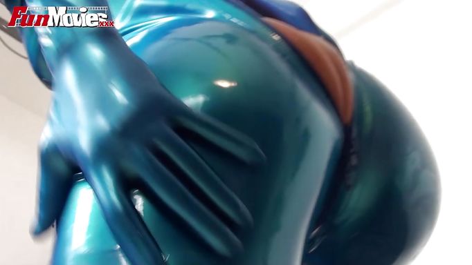 Oiled Whore Puts On Her Spandex Costume For Fun