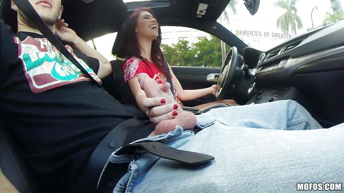 Redhead Cutie Gives Her Man A Handjob In The Car