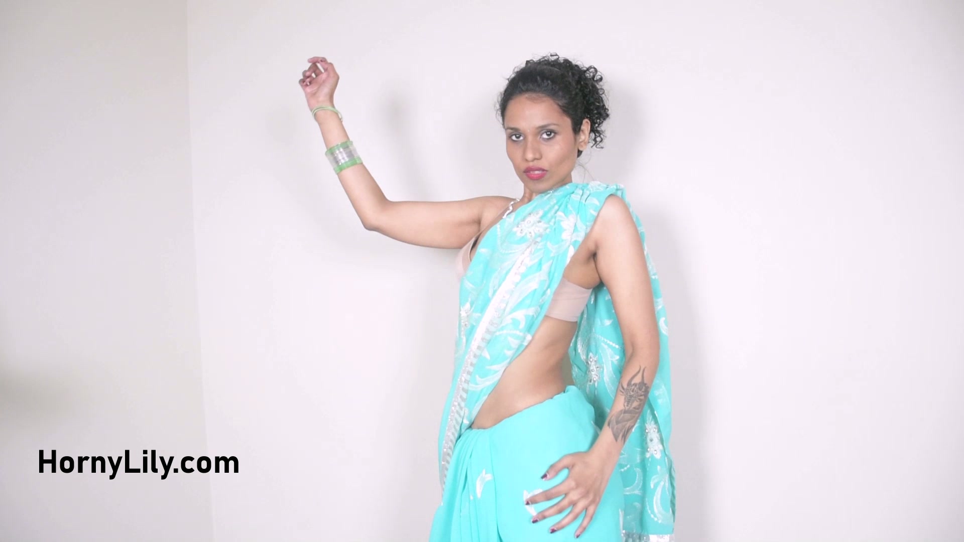 Horny Indian Housewife In Sari Dancing To Strip Naked In This Hd Homemade Porn/ image